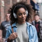 Woman wearing Bose headphones
